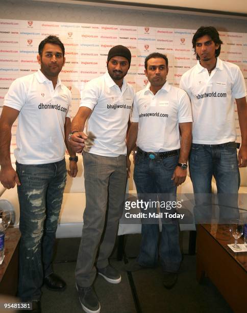 Dhoni, Harbhajan Singh, Virender Sehwag and Ishant Sharma during the launch of their personal websites in New Delhi on Monday, December 28, 2009.