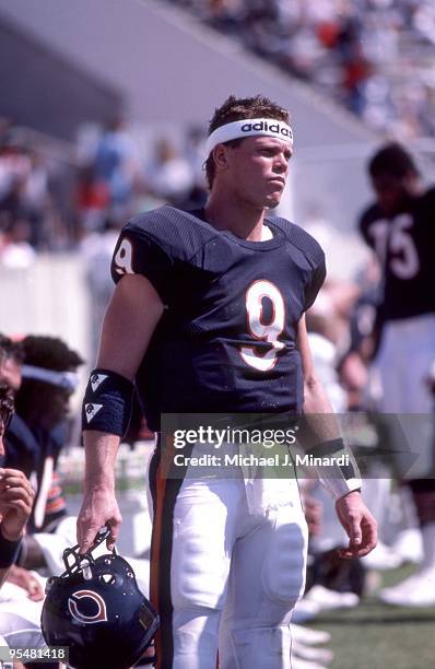 Jim McMahon of the Chicago Bears stands near the bench ready-go back in the NFL game against the Tampa Bay Buccaneers at Tampa Stadium on October 6,...