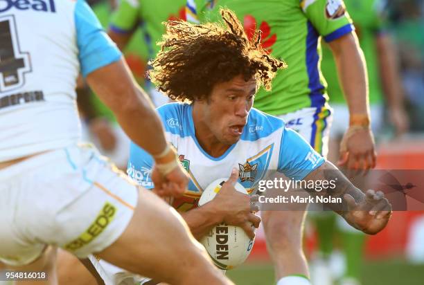 Kevin Proctor of the Titans heads to the line to score during the round nine NRL match between the Canberra Raiders and the Gold Coast Titans at GIO...