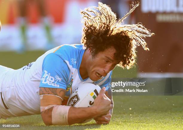 Kevin Proctor of the Titans scores a try during the round nine NRL match between the Canberra Raiders and the Gold Coast Titans at GIO Stadium on May...