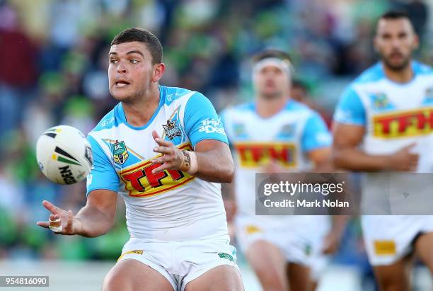 Ashley Taylor of the Titans passes during the round nine NRL match between the Canberra Raiders and the Gold Coast Titans at GIO Stadium on May 5,...