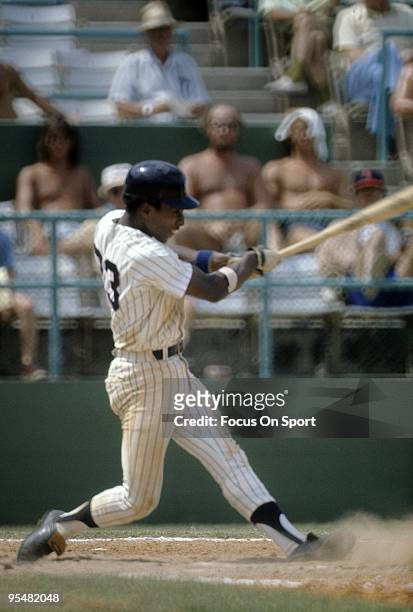 S: Second baseman Willie Randolph of the New York Yankees swings and watches the flight of his ball during a spring training Major League Baseball...