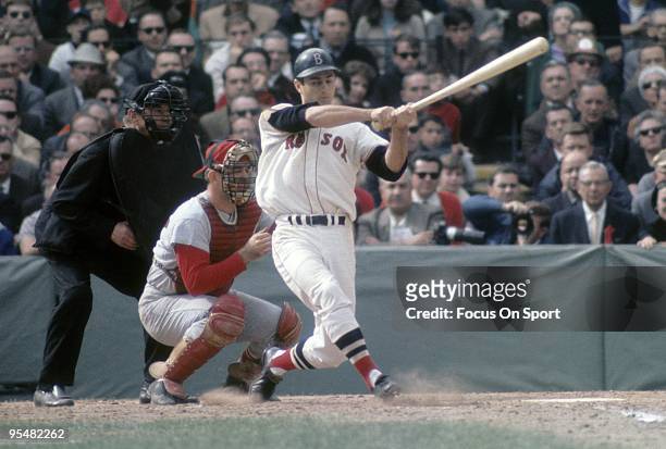 S: Outfielder Carl Yastrzemski of the Boston Red Sox swings at a pitch during a MLB baseball game circa 1960's at Fenway Park in Boston,...