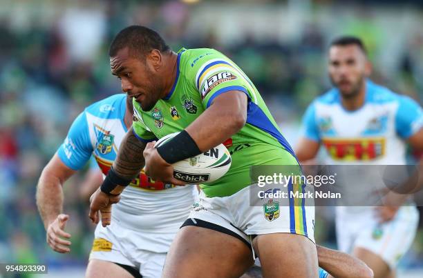 Junior Paulo of the Raiders runs the ball during the round nine NRL match between the Canberra Raiders and the Gold Coast Titans at GIO Stadium on...