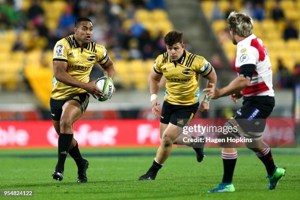 Julian Savea of the Hurricanes makes a break during the round 12 Super Rugby match between the Hurricanes and the Lions at Westpac Stadium on May 5,...