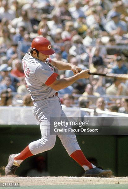 Catcher Johnny Bench of the Cincinnati Reds swings and watches the flight of his ball during a MLB baseball game circa 1960's. Bench Played for the...