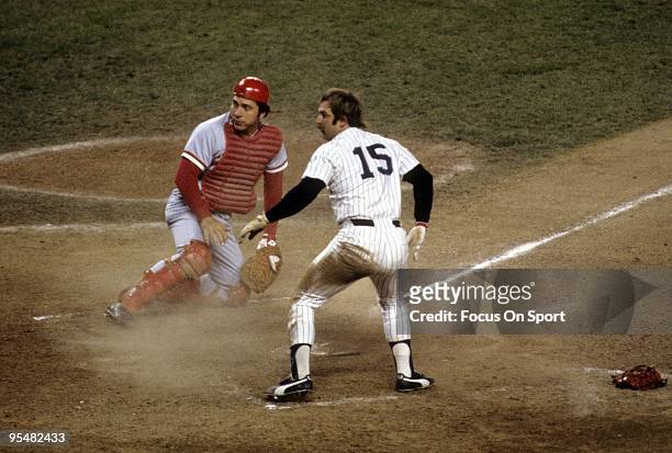 Catcher Johnny Bench of the Cincinnati Reds in action at home plate with Thurman Munson of the New York Yankees during the World Series in October...