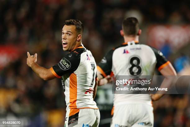 Luke Brooks of the Tigers reacts during the round nine NRL match between the New Zealand Warriors and the Wests Tigers at Mt Smart Stadium on May 5,...