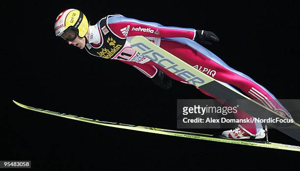 Andreas Kuettel of Switzerland competes during the FIS Ski Jumping World Cup event at the 58th Four Hills Ski Jumping Tournament on December 29, 2009...