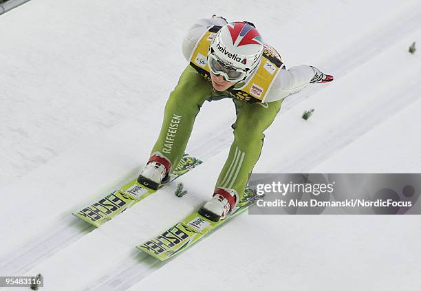 Simon Ammann of Switzerland competes during the FIS Ski Jumping World Cup event at the 58th Four Hills Ski Jumping Tournament on December 29, 2009 in...