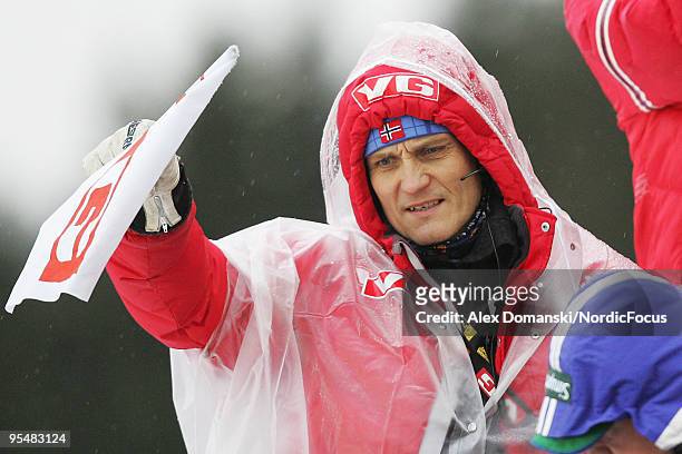 Mika Kojonkoski head coach of Norway lifts the flag for the start during the FIS Ski Jumping World Cup event at the 58th Four Hills Ski Jumping...