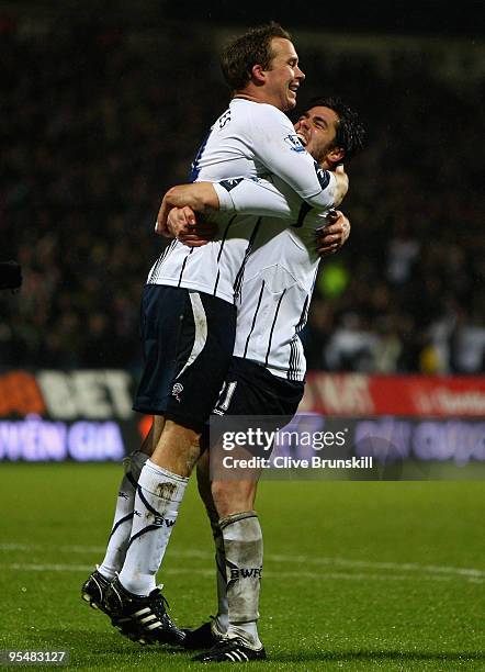 Kevin Davies of Bolton Wanderers is congratulated and lifted in the air by Tamir Cohen after scoring the second goal during the Barclays Premier...