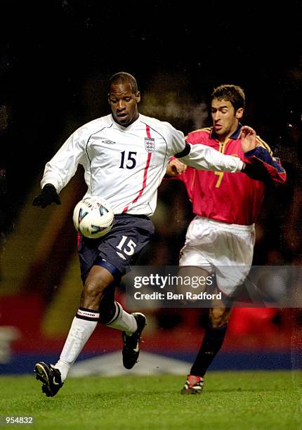 Ugo Ehiogu of England holds off Raul of Spain during the International Friendly played at Villa Park in Birmingham, England. England won the match...