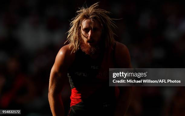 Dyson Heppell of the Bombers looks on during the 2018 AFL round seven match between the Essendon Bombers and the Hawthorn Hawks at the Melbourne...