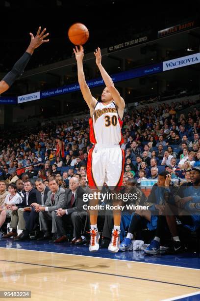 Stephen Curry of the Golden State Warriors shoots a jumper during the game against the Washington Wizards on December 18, 2009 at Oracle Arena in...