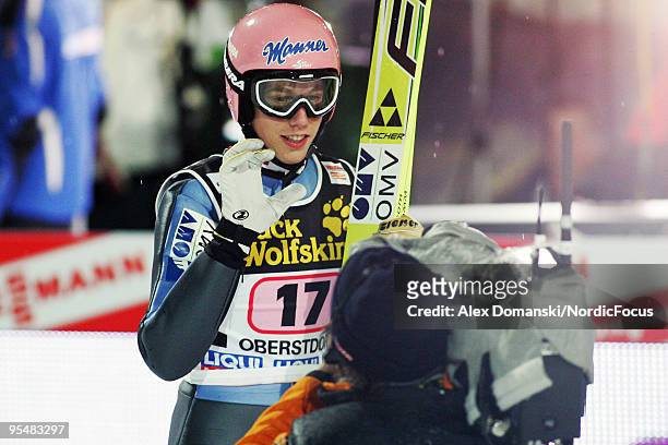 Lukas Mueller of Austria reacts during the FIS Ski Jumping World Cup event at the 58th Four Hills Ski Jumping Tournament on December 29, 2009 in...