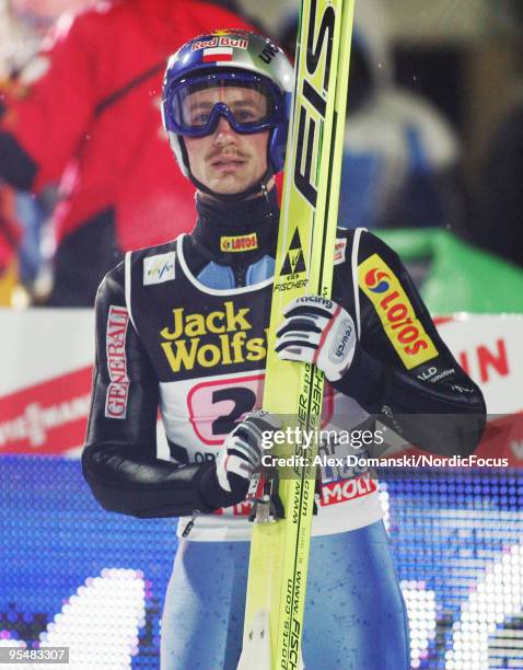 Adam Malysz of Poland competes during the FIS Ski Jumping World Cup event at the 58th Four Hills Ski Jumping Tournament on December 29, 2009 in...