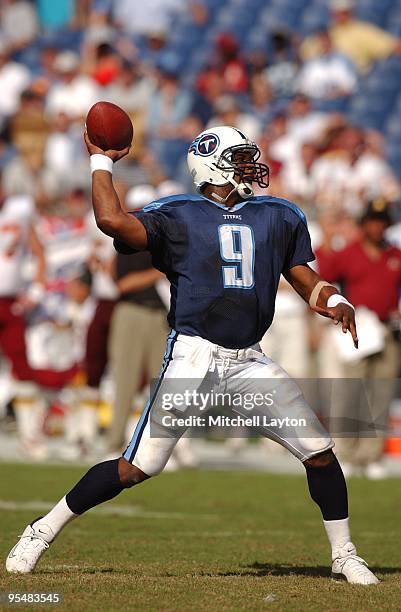 Steve McNair of the Tennessee Titans throws a pass during a NFL football game against the Washington Redskins on October 6, 2002 at FedEx Field in...