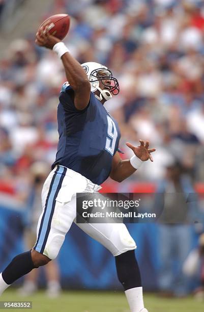 Steve McNair of the Tennessee Titans throws a pass during a NFL football game against the Washington Redskins on October 6, 2002 at FedEx Field in...