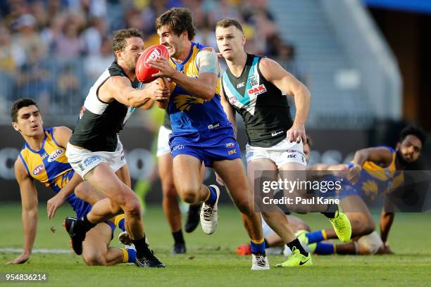 Andrew Gaff of the Eagles looks to break a tackle by Travis Boak of the Power during the round seven AFL match between the West Coast Eagles and the...