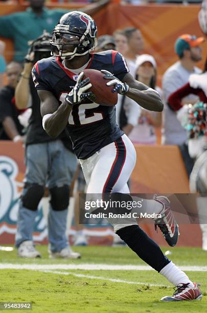 Jacoby Jones of the Houston Texans carries the ball against the Miami Dolphins at Land Shark Stadium on December 27, 2009 in Miami, Florida.