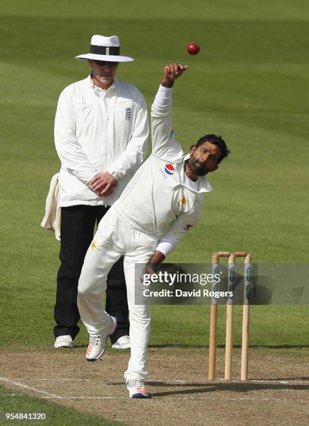 Asad Shafiq of Pakistan bowls during the tour match between Northamptonshire and Pakistan at The County Ground on May 4, 2018 in Northampton, England.