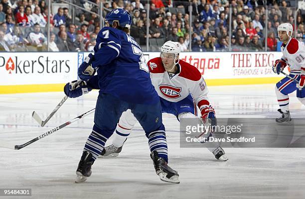 Benoit Pouliot of the Montreal Canadiens skates on the forecheck during their NHL game against the Toronto Maple Leafs at the Air Canada Centre on...