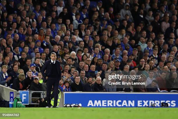 Brighton & Hove Albion Manager Chris Hughton looks on during the Premier League match between Brighton and Hove Albion and Manchester United at Amex...