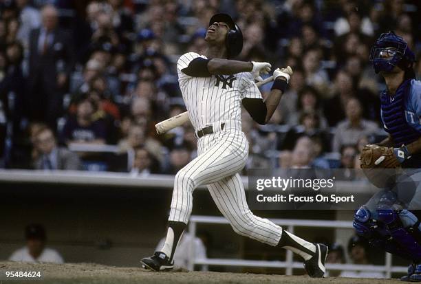 S: Second baseman Willie Randolph of the New York Yankees watches the flight of his ball as he follows through on a swing against the Kansas City...