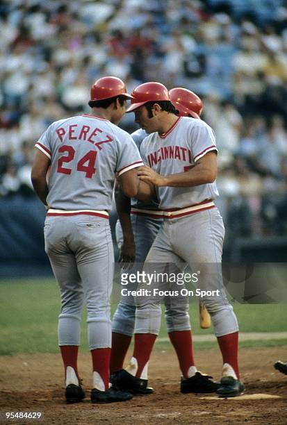 First Baseman Tony Perez of the Cincinnati Reds greets catcher and teammate Johnny Bench at home plate after bench hits a homerun during a Major...