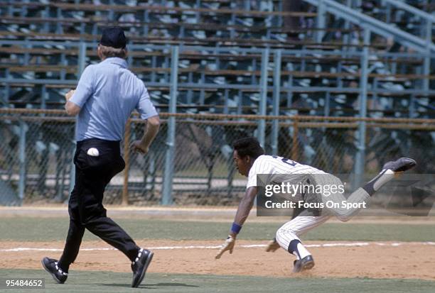 S: Second baseman Willie Randolph of the New York Yankees in action dives head first into third base during a spring training Major League Baseball...
