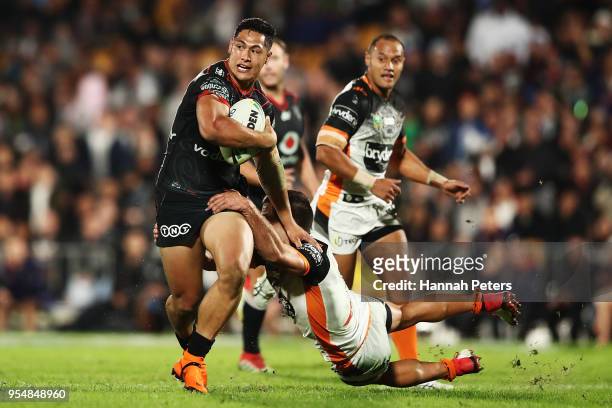 Roger Tuivasa-Sheck of the Warriors makes a break during the round nine NRL match between the New Zealand Warriors and the Wests Tigers at Mt Smart...