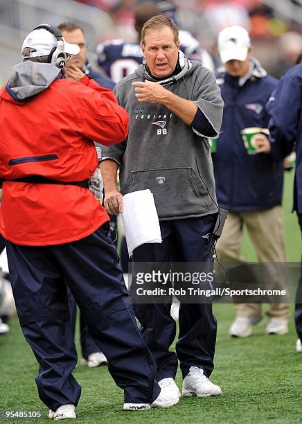 Bill Belichick head coach of the New England Patriots gestures on the bench against the Atlanta Falcons on September 27, 2009 at Gillette Stadium in...