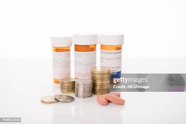 some coins with plastic bottle - gold kiwi stock pictures, royalty-free photos & images