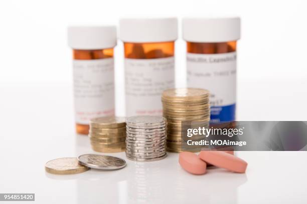 some coins with plastic bottle - gold kiwi stock pictures, royalty-free photos & images