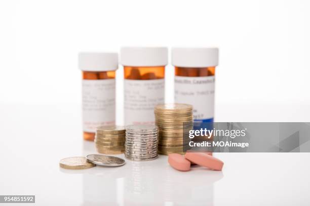 some coins with plastic bottle - gold kiwi stock pictures, royalty-free photos & images