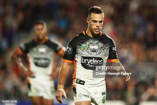 Luke Brooks of the Tigers looks on during the round nine NRL match between the New Zealand Warriors and the Wests Tigers at Mt Smart Stadium on May...