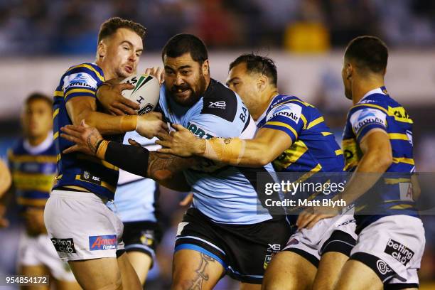 Andrew Fifita of the Sharks is tackled during the round nine NRL match between the Cronulla Sharks and the Parramatta Eels at Southern Cross Group...