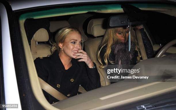 Lindsay Lohan and Dina Lohan seen leaving Intermix in SoHo on December 28, 2009 in New York City.