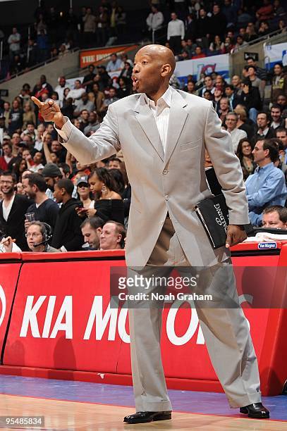 Assistant coach Sam Cassell of the Washington Wizards shouts from the sideline during the game against the Los Angeles Clippers at Staples Center on...