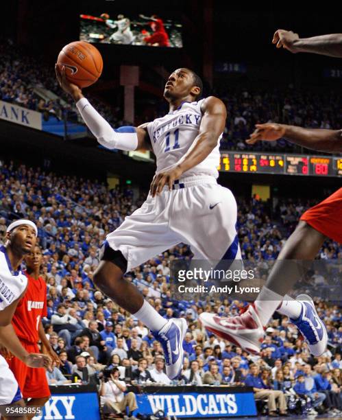 John Wall of the Kentucky Wildcats shoots the ball during the game against the Hartford Hawks at Rupp Arena on December 29, 2009 in Lexington,...