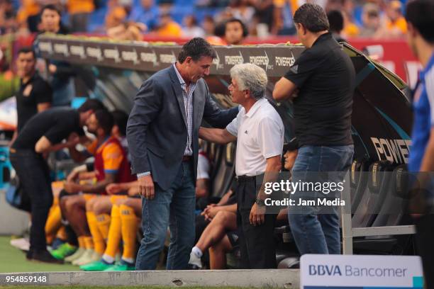 Robert Siboldi Coach of Santos greets Ricardo Ferretti Coach of Tigres during the quarter finals first leg match between Tigres UANL and Santos...