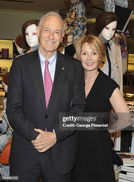 Vice Chairman Rogers Communications Inc. Phil Lind and Ellen Rowland attend the Prada Book Launch Party at the Prada Boutique on December 15, 2009 in...