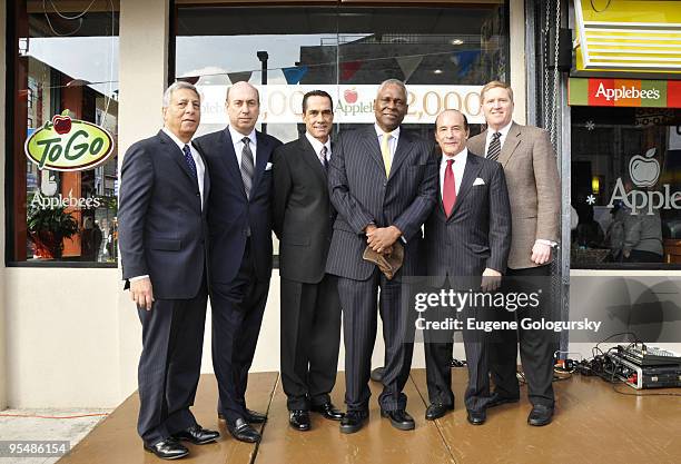 Frank Venice, Roy Raeburn, Miguel Fernandez, Zane Tankel, Mike Archer and Keith Wright attend the Applebee's Milestone Restaurant opening in Harlem...