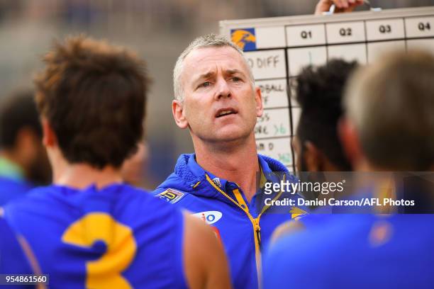 Adam Simpson, coach of the Eagles addresses the team at quarter time during the 2018 AFL round seven match between the West Coast Eagles and the Port...
