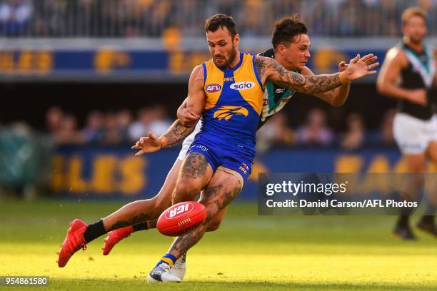 Chris Masten of the Eagles is tackled by Aidyn Johnson of the Power during the 2018 AFL round seven match between the West Coast Eagles and the Port...