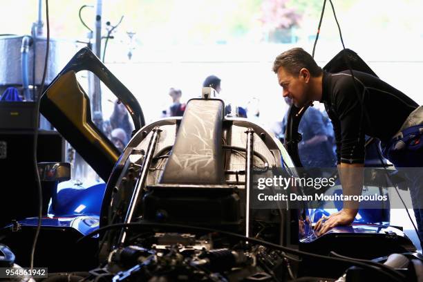 General view of a crew member looks at SIGNATECH ALPINE MATMUT in the Alpine A470 - Gibson driven by Nicolas Lapierre of France, Andre Negrao of...