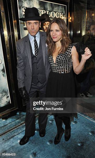 Robert Downey Jr and wife Susan Levin attend the World Premiere of 'Sherlock Holmes' at Empire Leicester Square on December 14, 2009 in London,...
