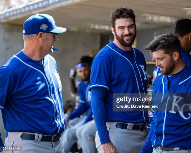 Brian Flynn of the Kansas City Royals talks with third base coach Mike Jirschele during a MLB game against the Detroit Tigers at Comerica Park on...