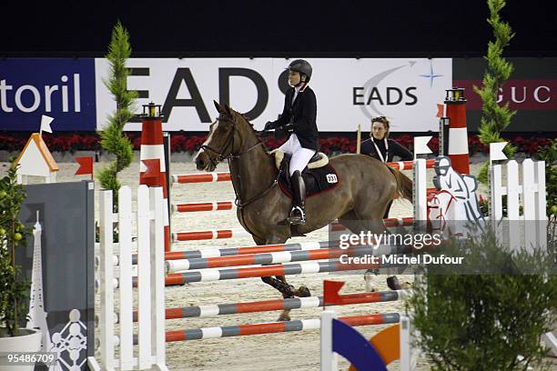 Martina Hingis rides and competes during the Gucci Masters Competition at Paris Nord Villepinte on December 11, 2009 in Paris, France.